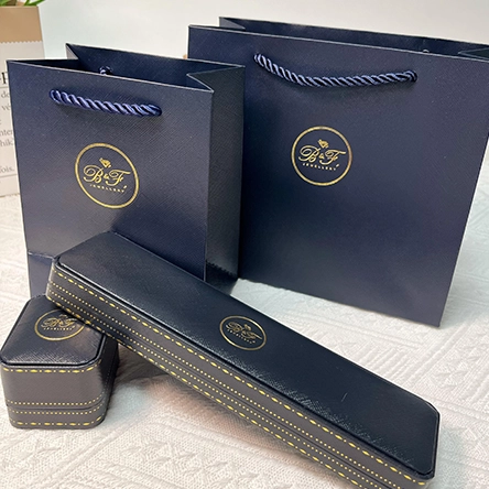 Blue jewelry box and shopping bag set
